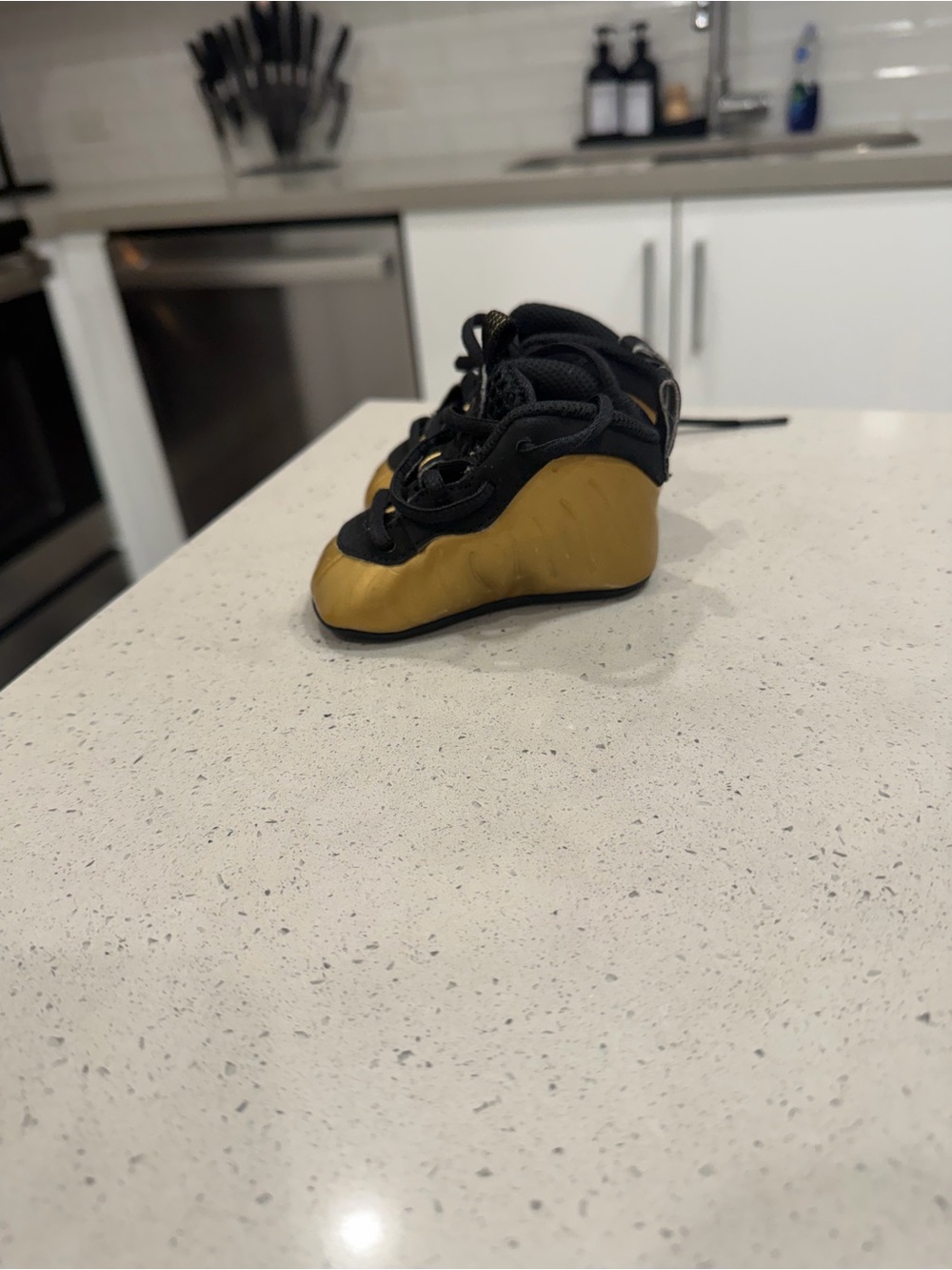 Nike Kids Metallic Gold and Black Foam Runner Sneakers